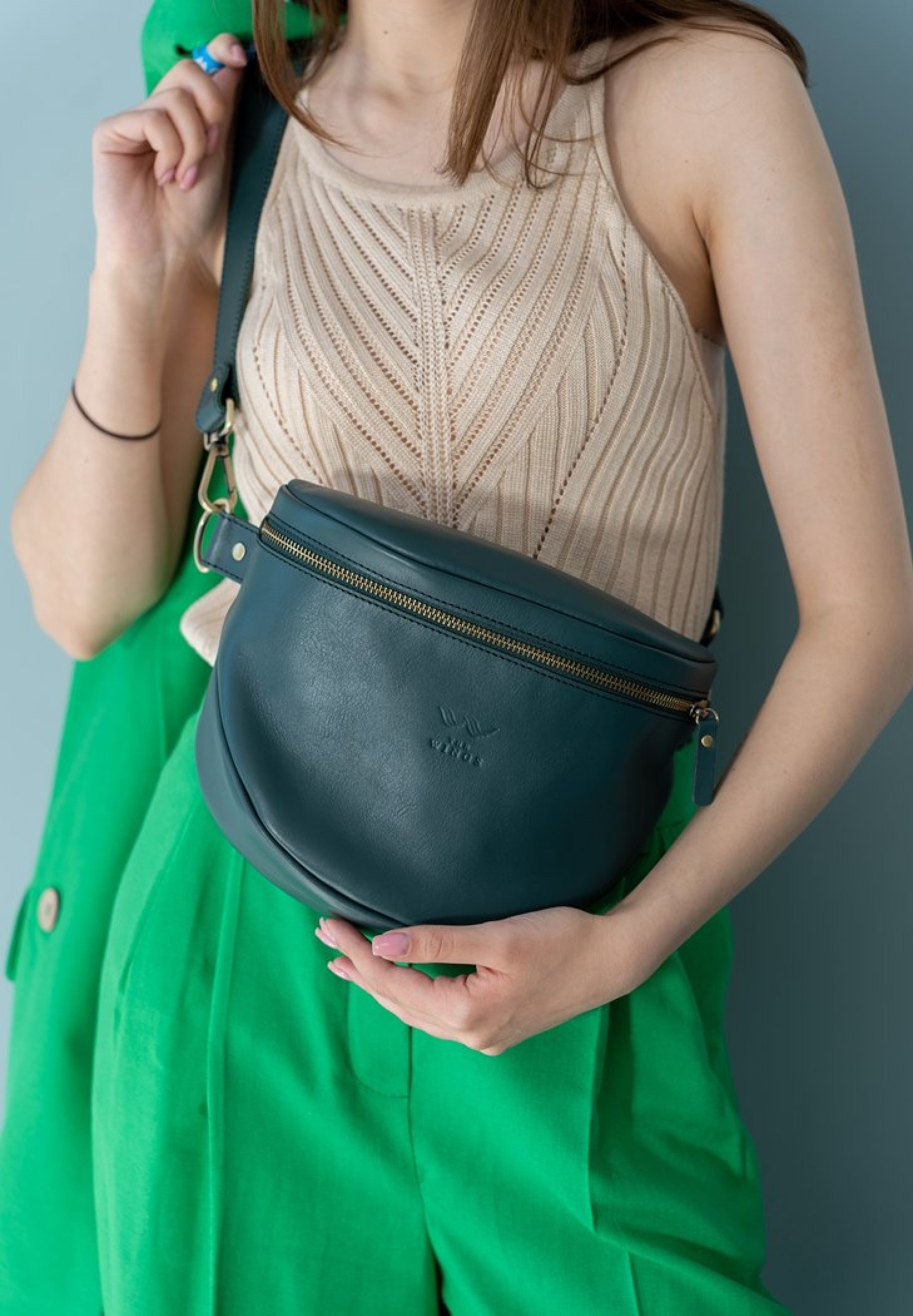 beautiful woman is wearing a Women's leather bag, handmade leather bags, handmade women's leather bags, personalized gifts, handmade genuine leather bag, leather accessories, handmade leather accessories, coach bag, bag aesthetic, tote bag, shoulder bag, green leather crossbody bag